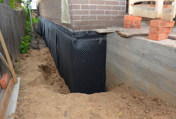 Happy homeowners after waterproofing job in Vonore